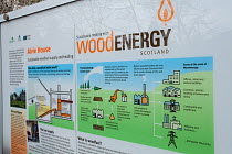 Information sign about biomass heating using wood chips. Scotland, UK, May.