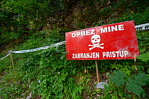 Land mine warnings, as result of Bosnian war, Velebit Nature Park, Rewilding Europe area, Velebit mountains, Croatia June 2012