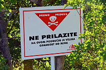 Land mine warning, as result of war activity, Velebit Nature Park, Rewilding Europe area, Velebit mountains, Croatia June 2012