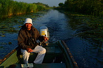 Boat guide and pension owner Florin Oprisan, tourism for the delta, Danube delta rewilding area, Romania May 2012