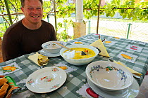 Fish soup serving at Mama Sika's guesthouse, Sfintu Gheorghe, Danube delta rewilding area, Romania, June 2012
