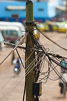 Telephone cables and junction box on post, signs of development of third world infrastructure, Sao Tome, Democratic Republic of Sao Tome and Principe, off Gulf of Guinea, Central Africa 2009
