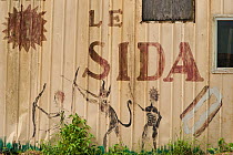 AIDS / HIV / Sida related art campaign painted onto the side of a container in Gamba town, Ogooue-Maritime / Nyanga, Gabon, February 2009