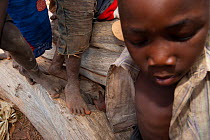 Barefoot Mozambican children. Pemba to Montepuez highway, north-eastern Mozambique, November 2011.
