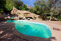 Swimming pool at Olarro, private lodge in Loita Hills, over Greater Masai Mara towards Tanzania, Kenya September 2011