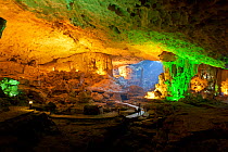 Inside floodlit Sung Sot cave in Ha Long Bay, a UNESCO World Heritage Site, and a popular travel destination, located in Quang Ninh province, Vietnam.