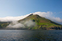 View of active volcano at Chirpoy Island, Kurils, Russian Far East. Chirpoy (meaning small bird) is the collective name usually given to the twin volcanic islands of Chirpoy and Brat Chirpoev (Russian...