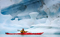 Kayaking past icebergs in Svalbard, Norway, July 2011