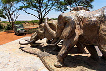 Memorial to 1989 burning of ten tonnes of ivory, by Kenyan president Daniel arap Moi, Nairobi National Park, Kenya, October 2012