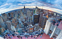 Wide angle Manhattan view towards Empire State Building at sunset from Top of the Rock, at Rockefeller Plaza, New York, USA 2011