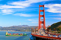 Large container ship about to go under Golden Gate Bridge, San Francisco, California, USA 2011