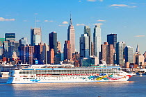 Huge luxury cruise liner infront of Midtown Manhattan across the Hudson River, New York, USA, October 2011