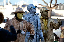 People pretending to be statues - statue mimes at Fisherman's Wharf, San Francisco, California, USA, June 2011