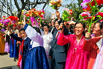 Women in traditional dress during street celebrations on the 100th anniversary of the birth of President Kim IL Sung, Pyongyang, Democratic Peoples' Republic of Korea (DPRK) North Korea, 15 April 2012
