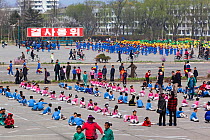 Children practising mass games outside the Grand Theatre, Hamhung, Democratic Peoples' Republic of Korea (DPRK), North Korea 2012