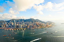 Elevated view across the busy Hong Kong harbour, Central district of Hong Kong Island and Victoria Peak, Hong Kong, China 2011