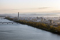 Elevated city skyline of capital Pyongyang and Taedong river, Democratic Peoples' Republic of Korea (DPRK), North Korea, 2012