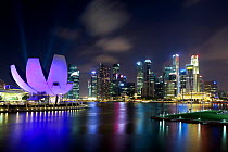 Art Science Museum and city skyline at night, seen from Marina Bay, Singapore, 2012