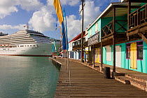 Large cruise ship docked alongside Heritage Quay shopping district in St. John's, Antigua, Antigua and Barbuda, Leeward Islands, Lesser Antilles, Caribbean, West Indies, 2012