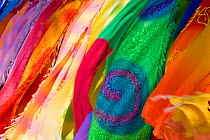 Colourful cloth designs for sale along Jolly Beach, Antigua, Antigua and Barbuda, Leeward Islands, Lesser Antilles, Caribbean, West Indies, 2012