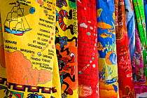 Colourful cloth designs / beach towels for sale along Jolly Beach, Antigua, Antigua and Barbuda, Leeward Islands, Lesser Antilles, Caribbean, West Indies, 2012