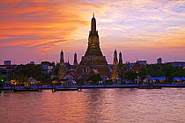 Wat Arun, Temple Of The Dawn and Chao Phraya River at sunset, Bangkok, Thailand, 2010