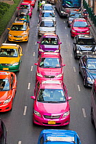 Colourful Taxi cabs on Ploenchit Road, Sukhumvit, Bangkok, Thailand, 2010