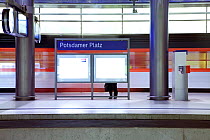 Moving train pulling into the station in new train station, Berlin, Germany 2007
