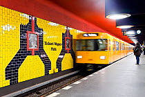 Moving train pulling into the station in new subway train station, Berlin, Germany 2009