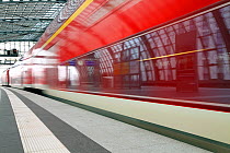Train pulling into the platform, new modern main railway station at Berlin, Germany 2009