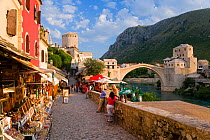 Cobbled street lined with colourful houses known as Kujundziluk, one of the oldest streets in Mostar leading to the Old Bridge, Old Town, Mostar, Herzegovina, Bosnia and Herzegovina, Balkans, 2007