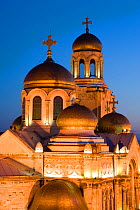 Cathedral of the Assumption of the Virgin, built between 1880 and 1886 is the main symbol of the city with it's gold domes and stained glass windows, illuminated at dusk, Varna, Black Sea Coast, Bulga...