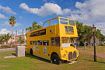 Old tourist yellow double decker bus outside Royal Naval Dockyard, Sandys Parish, Bermuda 2007