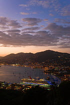 Elevated view at dusk over Charlotte Amalie and the Cruise Ship dock of Havensight, St Thomas, US Virgin Islands, Leeward Islands, Lesser Antilles, Caribbean, West Indies 2008