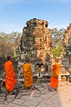 The Bayon Temple with buddhist monks, Angkor Wat, Siem Reap, Cambodia, 2010