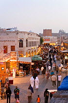 The restored Souq Waqif with mud rendered shops and exposed timber beams, Doha, Qatar, Arabian Peninsula, 2011