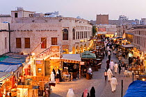 The restored Souq Waqif with mud rendered shops and exposed timber beams, Doha, Qatar, Arabian Peninsula, 2011