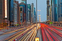 Sheikh Zayed Rd at dusk with traffic and new high rise buildings along Dubai's main road, United Arab Emirates, 2011