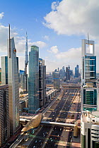 Elevated view over the modern Skyscrapers along Sheikh Zayed Road looking towards the Burj Kalifa, Dubai, United Arab Emirates 2011. No release available.
