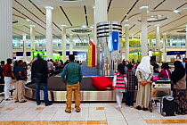 inside Terminal 3, Baggage Carousel in the Arrivals Hall, Dubai International Airport, Dubai, United Arab Emirates 2011