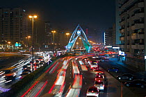 Traffic congestion at night at the Clock Tower roundabout on Al-Maktoum Road, Dubai, United Arab Emirates 2011