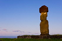 Moai statue Ahu Ko Te riku, the only topknotted and eyeballed Moai on the Island at dusk, Easter Island, Rapa Nui, Chile 2008