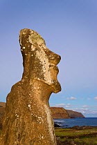 Profile of a lone monolithic giant stone Moai statue at Tongariki, Isla de Pascua / Easter Island, Rapa Nui, Chile 2008