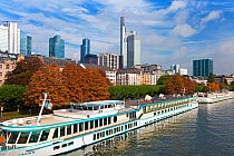 River scene with city skyline in background, Frankfurt, Hesse, Germany 2010