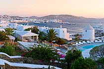 Elevated view over the harbour and old town at dusk, Mykonos (Hora), Cyclades Islands, Greece, 2010
