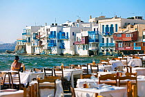 People at cafe along Little Venice waterfront, Mykonos (Hora), Cyclades Islands, Greece, 2010