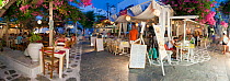 Panoramic view of restaurants in the old town at night, Mykonos (Hora), Cyclades Islands, Greece, 2010