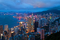 View over Hong Kong from Victoria Peak, the illuminated skyline of Central sits below The Peak, China 2009