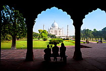 Taj Mahal, UNESCO World Heritage Site, viewed through decorative stone archway, Agra, Uttar Pradesh, India, 2011