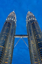 Petronas Towers at night - 88 storey steel clad twin towers with a height of 451.9 metres - the iconic symbol of Kuala Lumpar, Selangor, Malaysia 2008